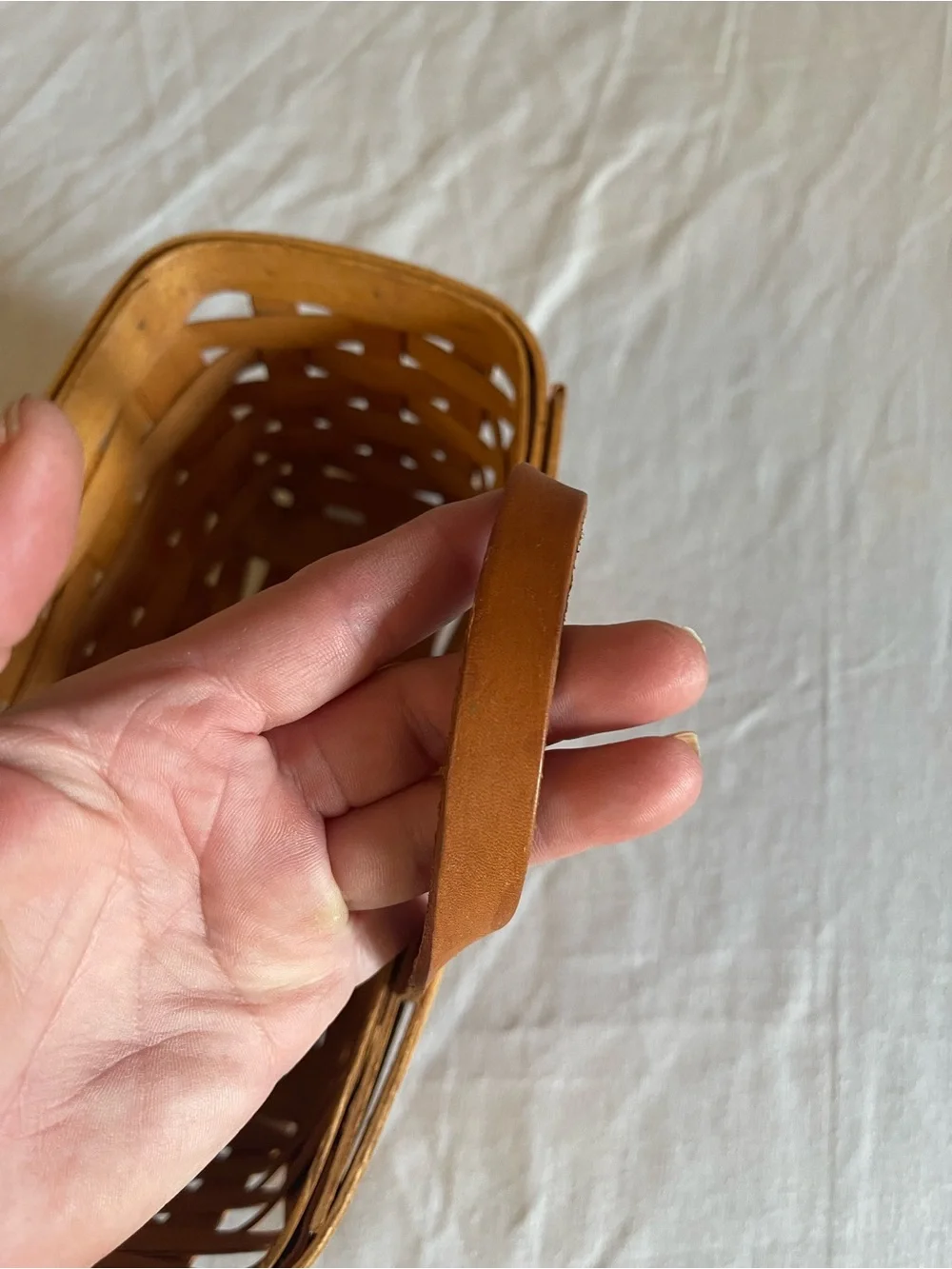 Longaberger woven basket in warm tan
